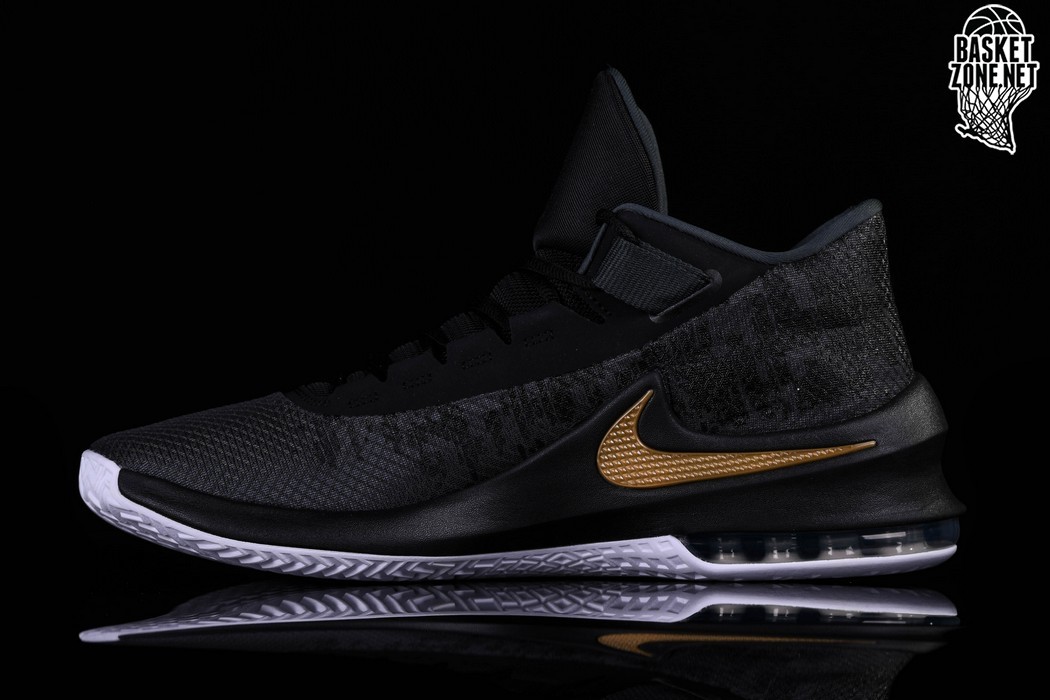 black nikes with gold swoosh